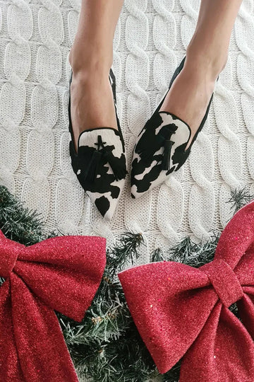 COW PRINT LOAFERS WITH TASSEL |